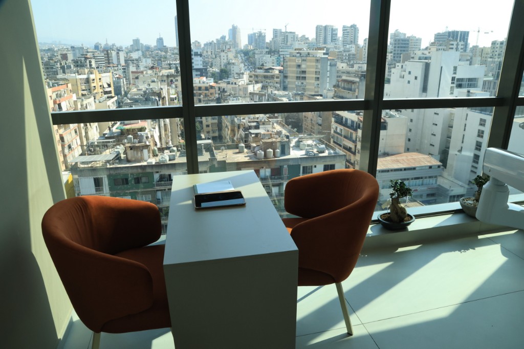 Consultation desk at Experteeth looking over the city